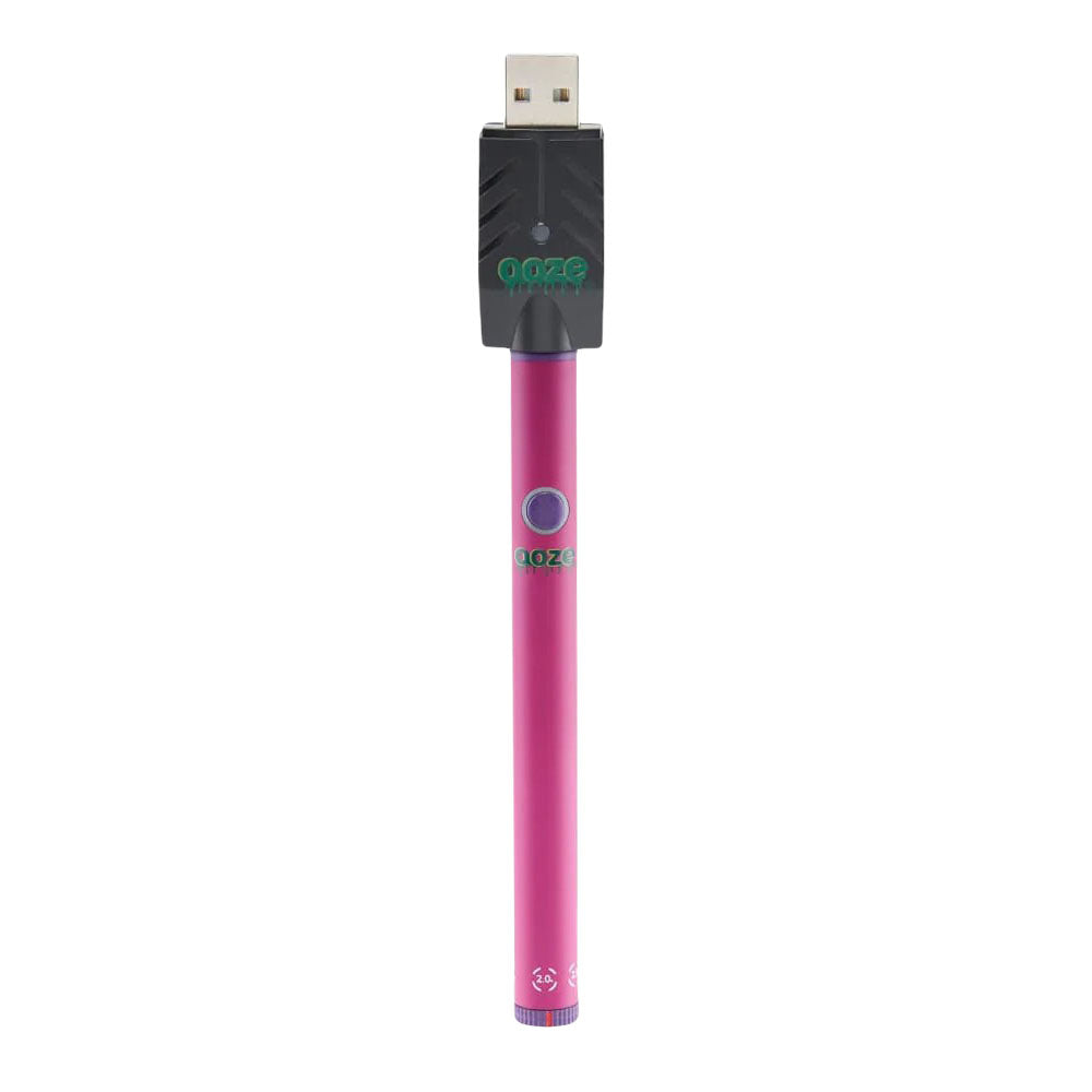 a pink and black pen with a usb cable attached to it