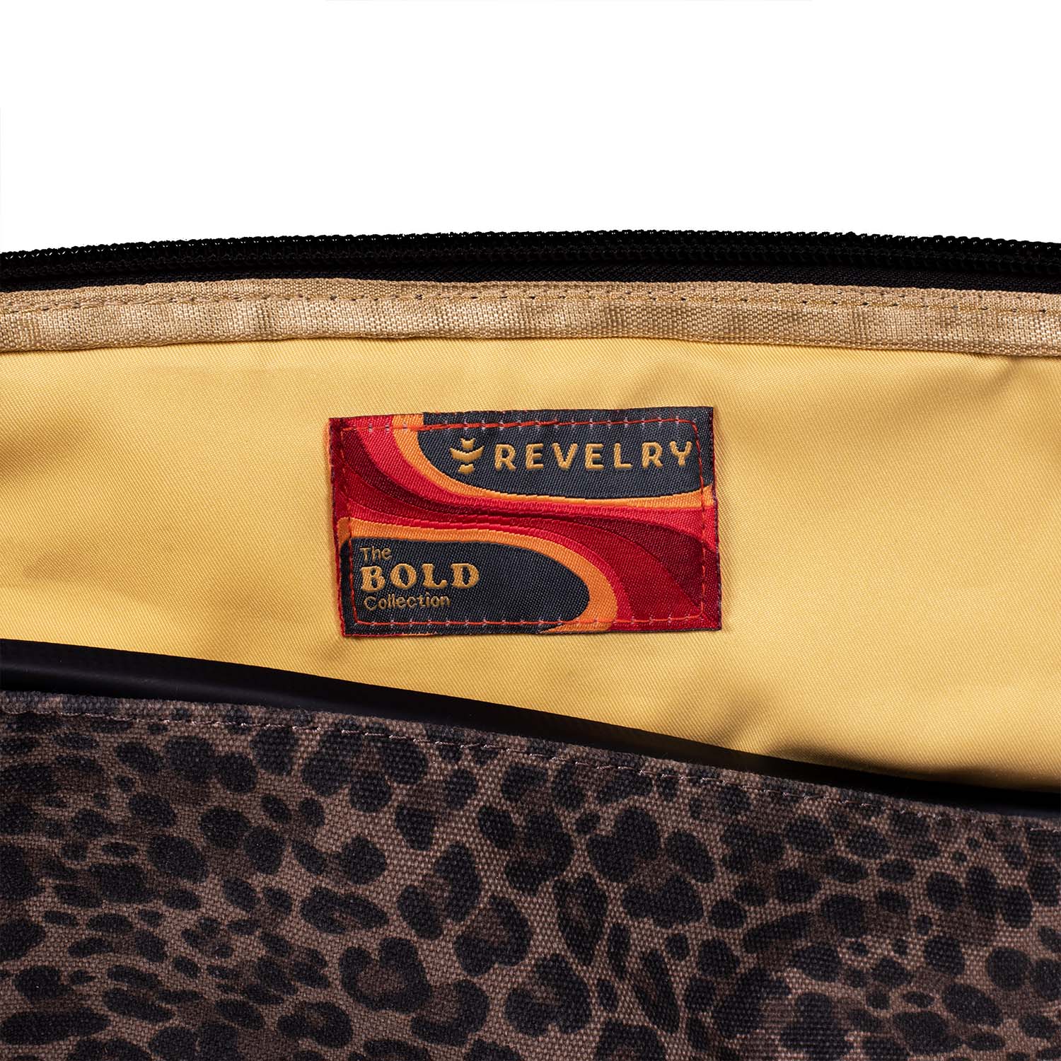 a leopard print purse with a label on it