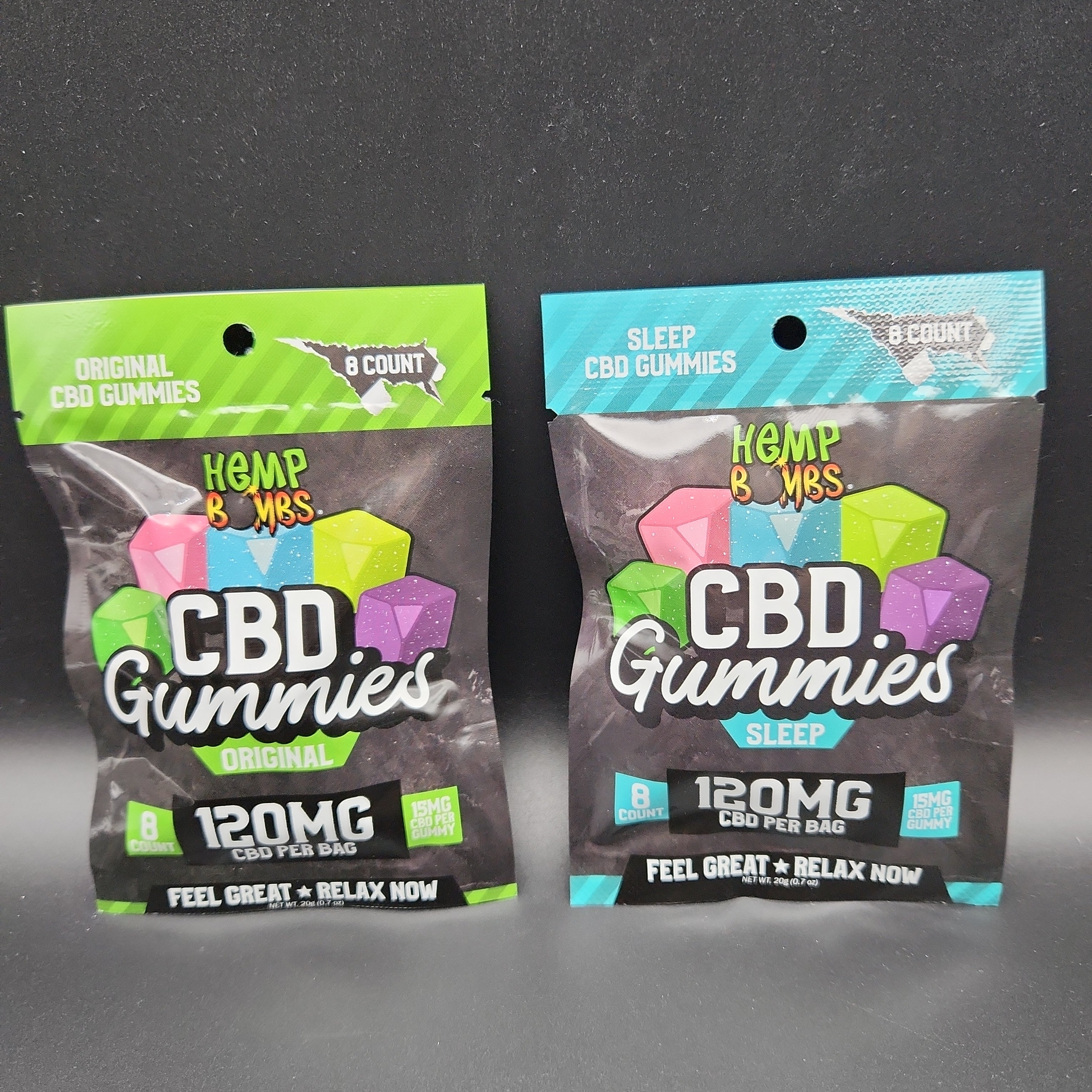 two bags of cbd gummies sitting next to each other