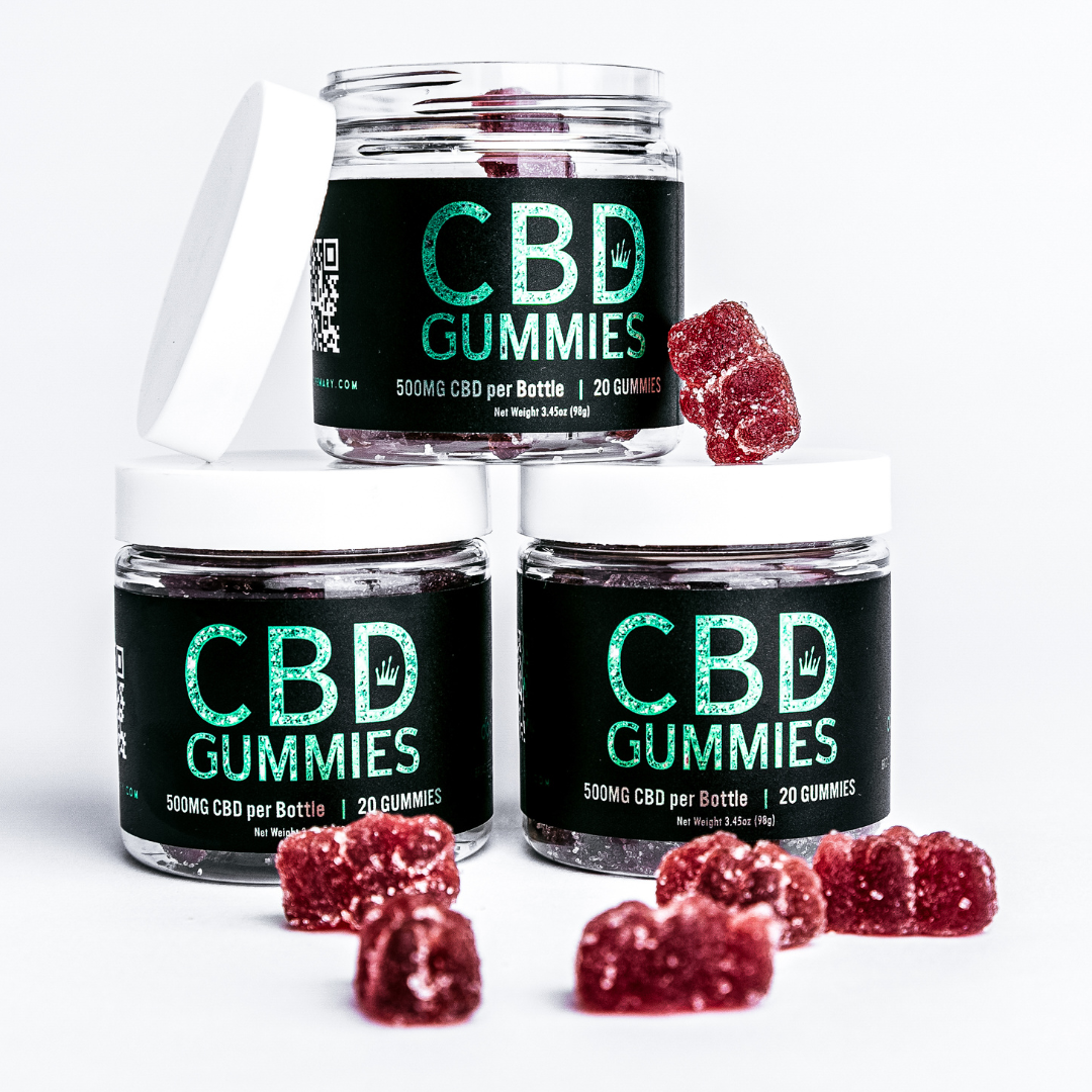 three jars of cbd gummies sitting next to each other