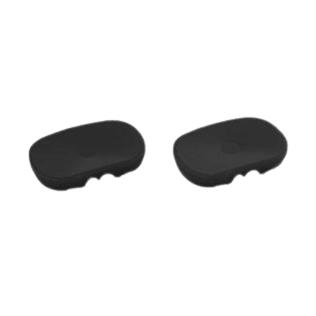 a pair of black plastic pads on a white background