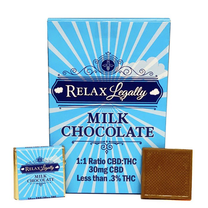 a box of relax legally milk chocolate next to a box of chocolate