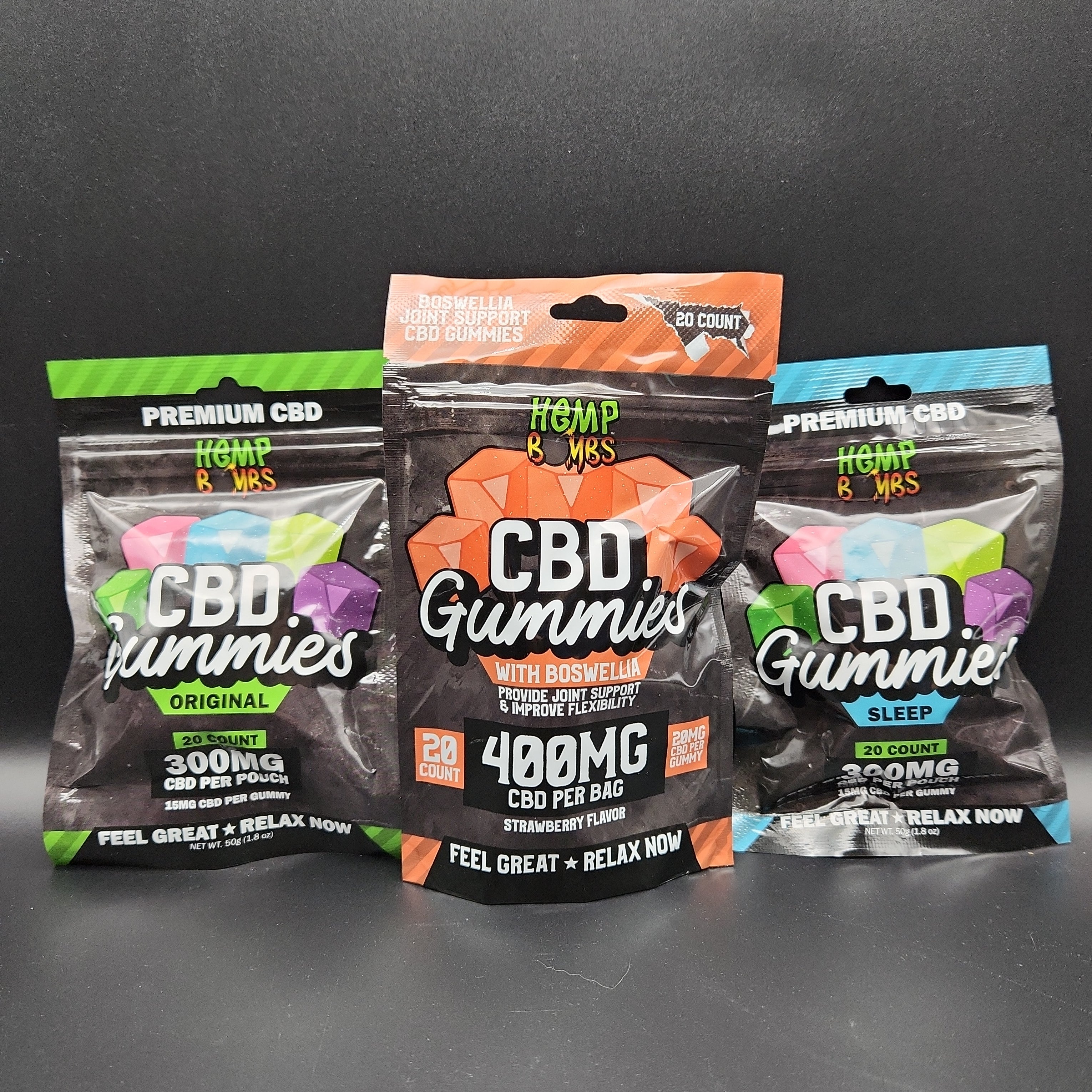 three bags of cbd gummies sitting on a table