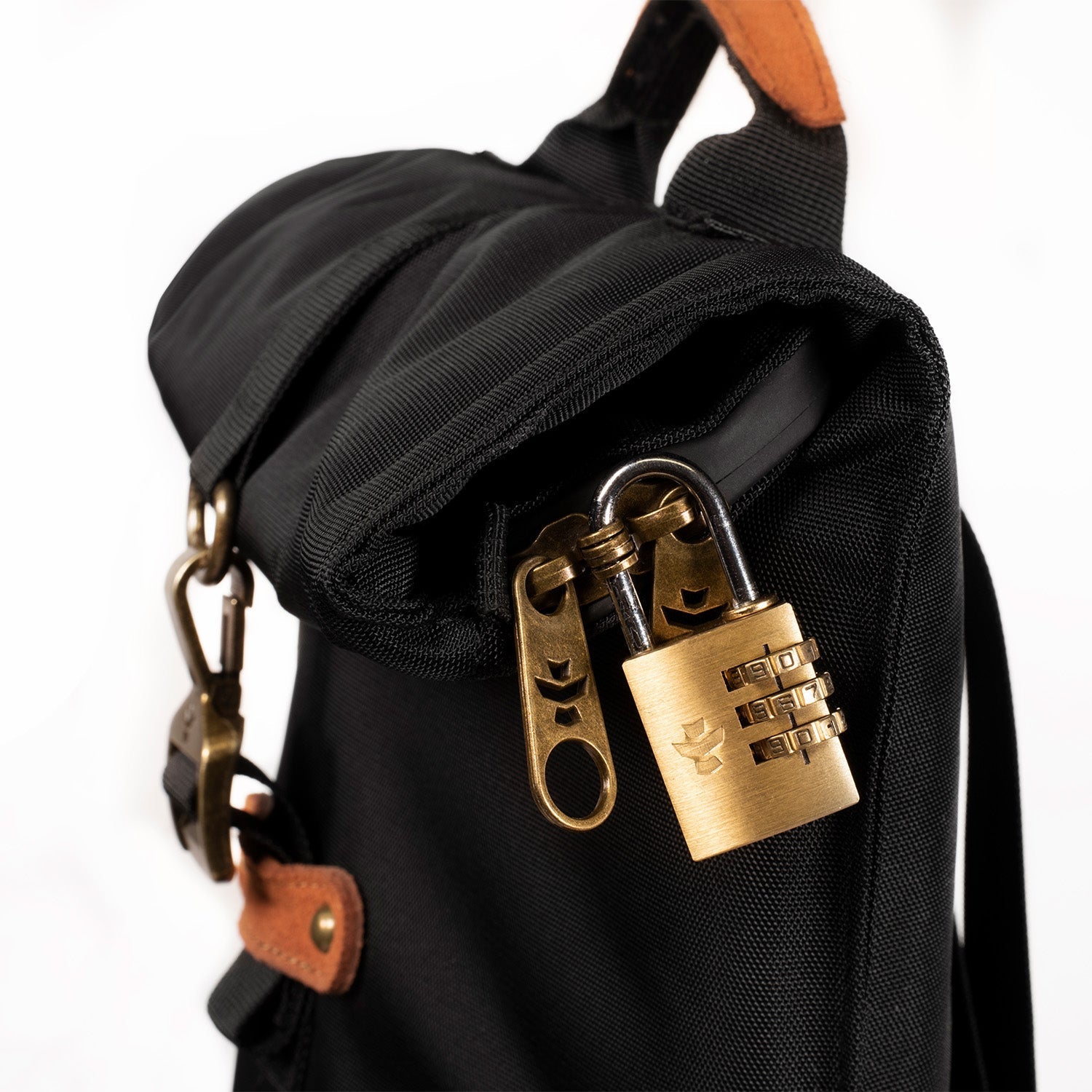 a black backpack with a gold padlock