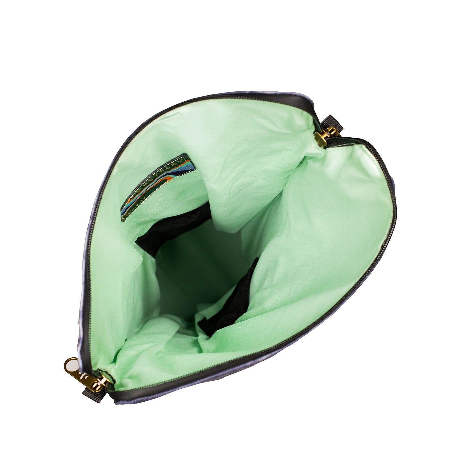 the inside of a green purse on a white background