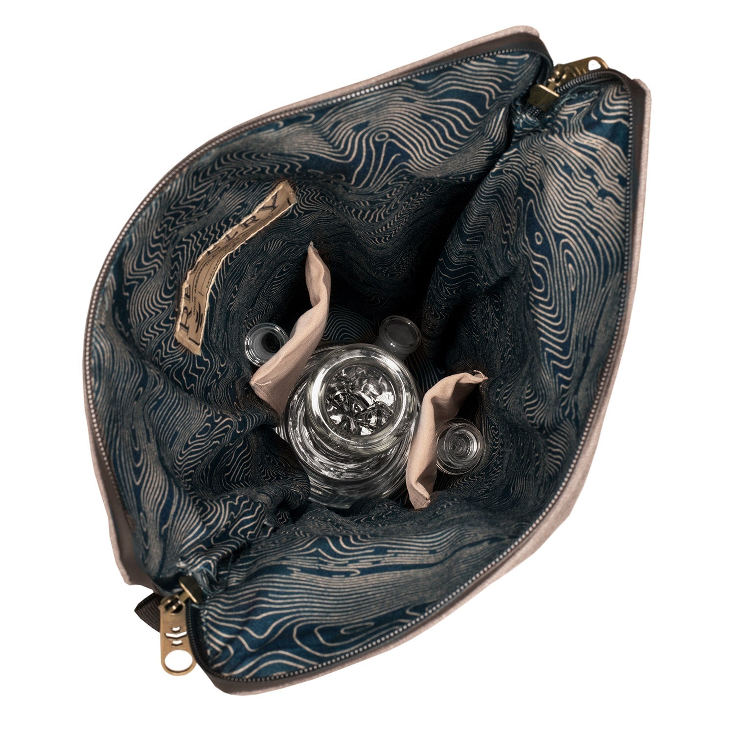 a blue purse with a silver object inside of it