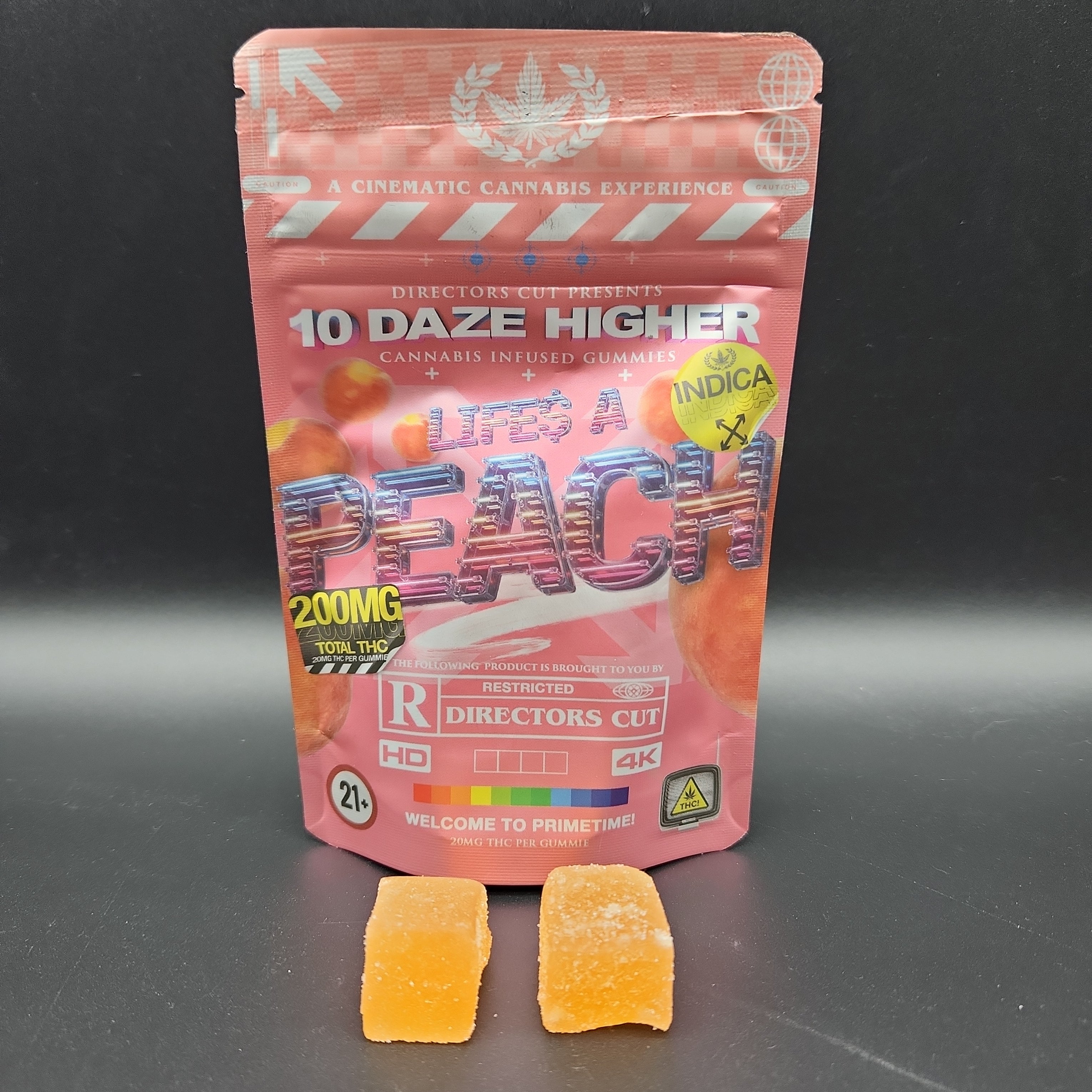 a bag of peach gummy bears sitting on a table