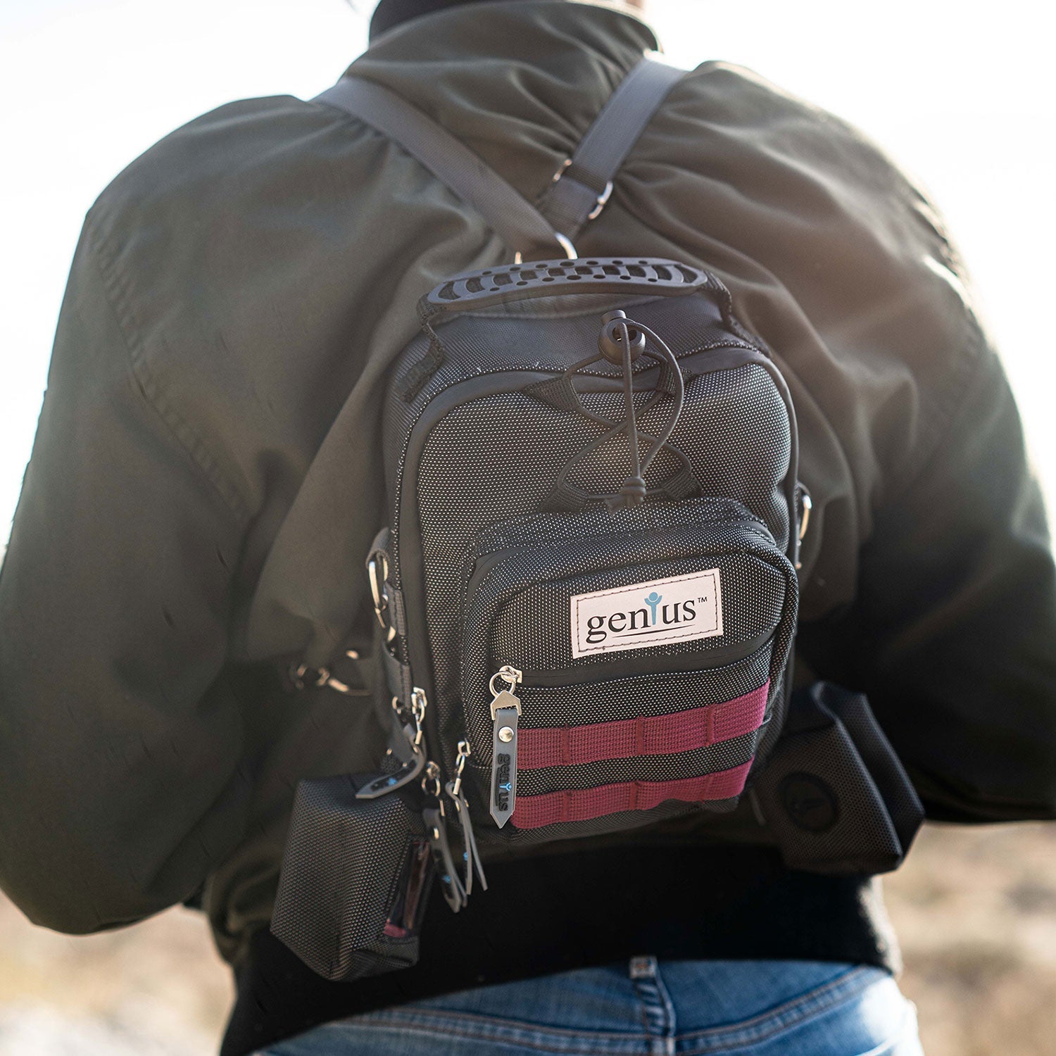 a person wearing a backpack with a name tag on it