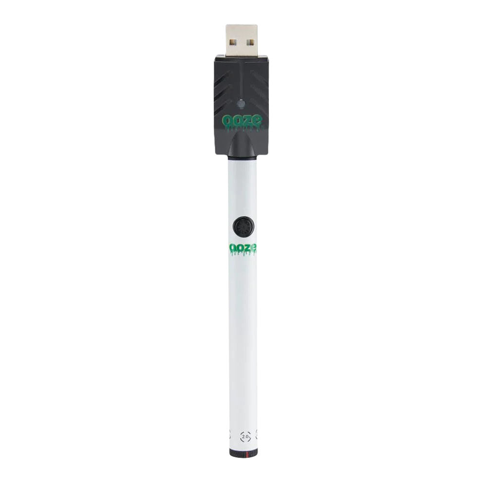 a white and black pen with a green logo on it