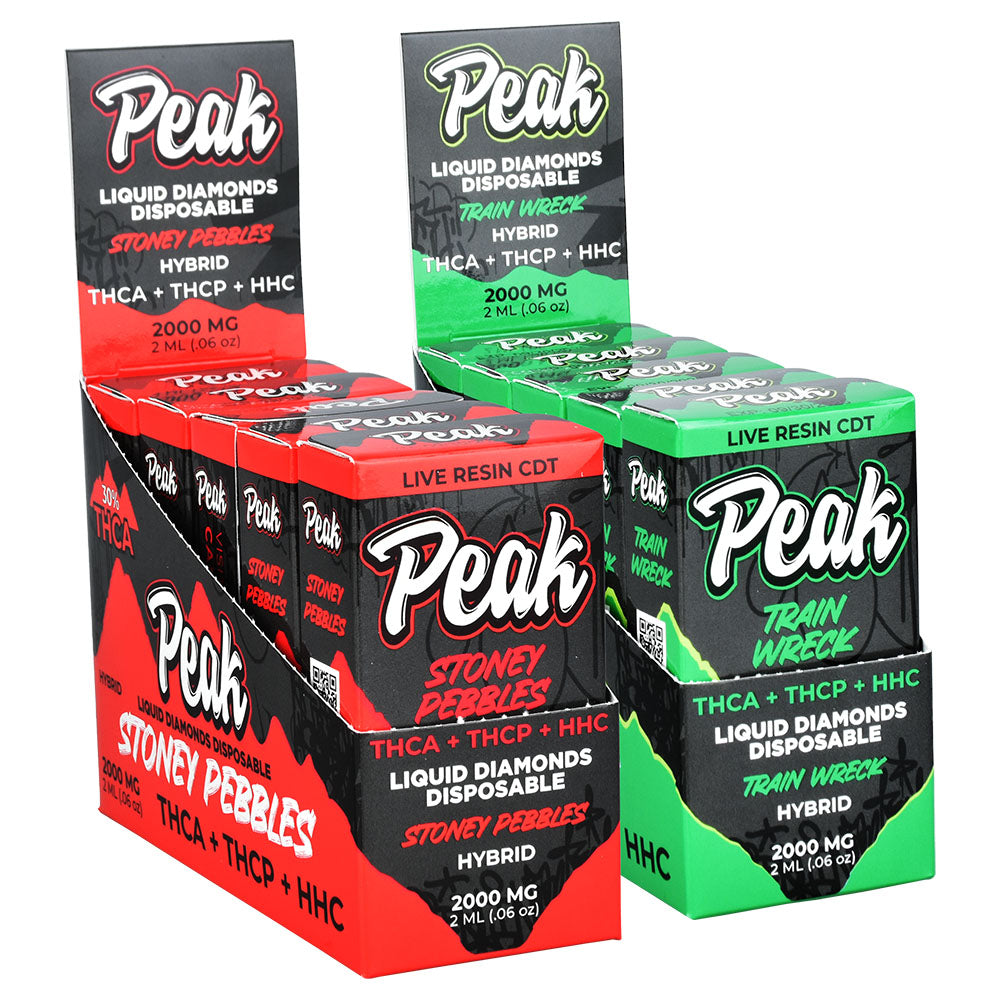 a group of four boxes of peak energy drink