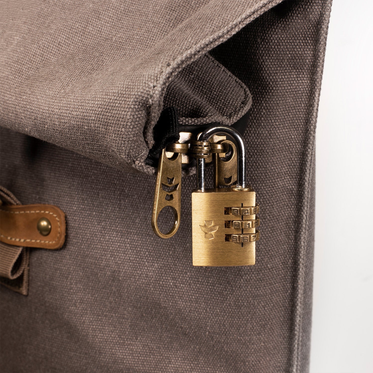 a close up of a padlock on a bag