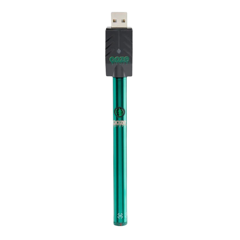 a green pen with a usb cable attached to it