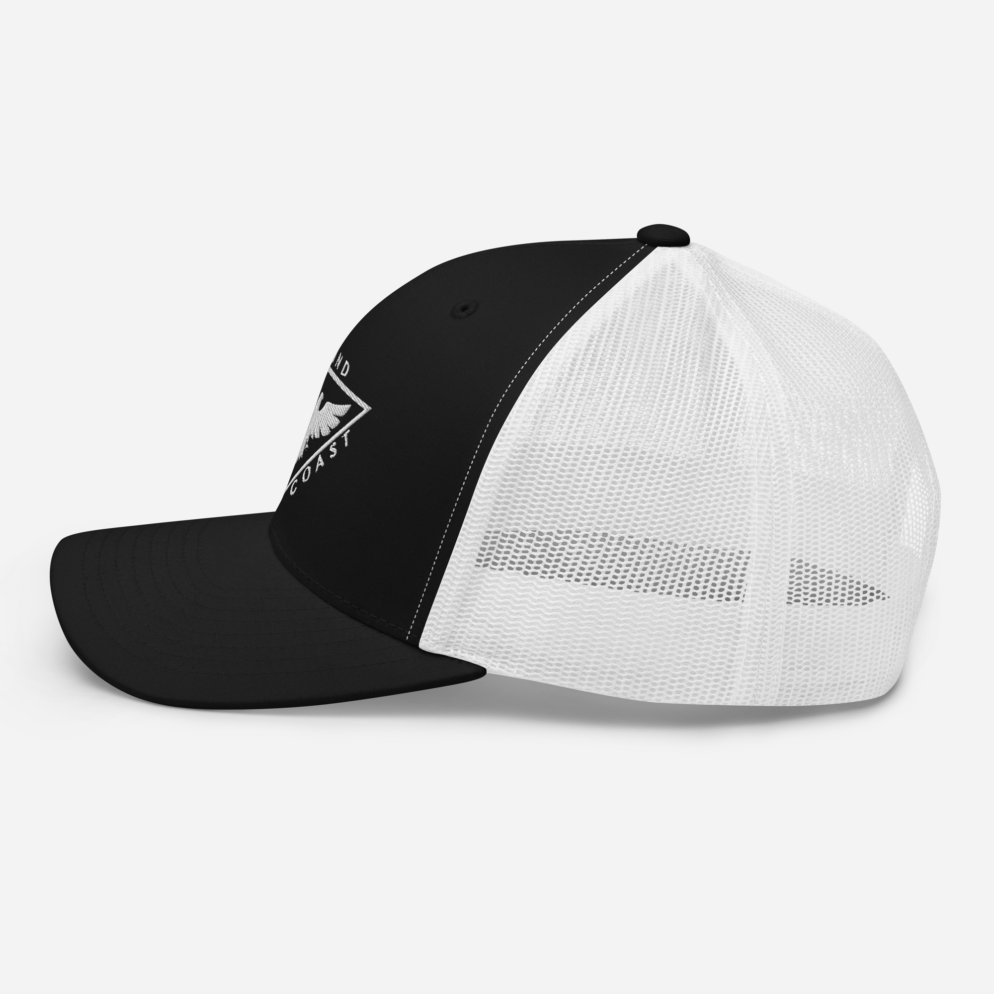 a black and white hat with a white peak