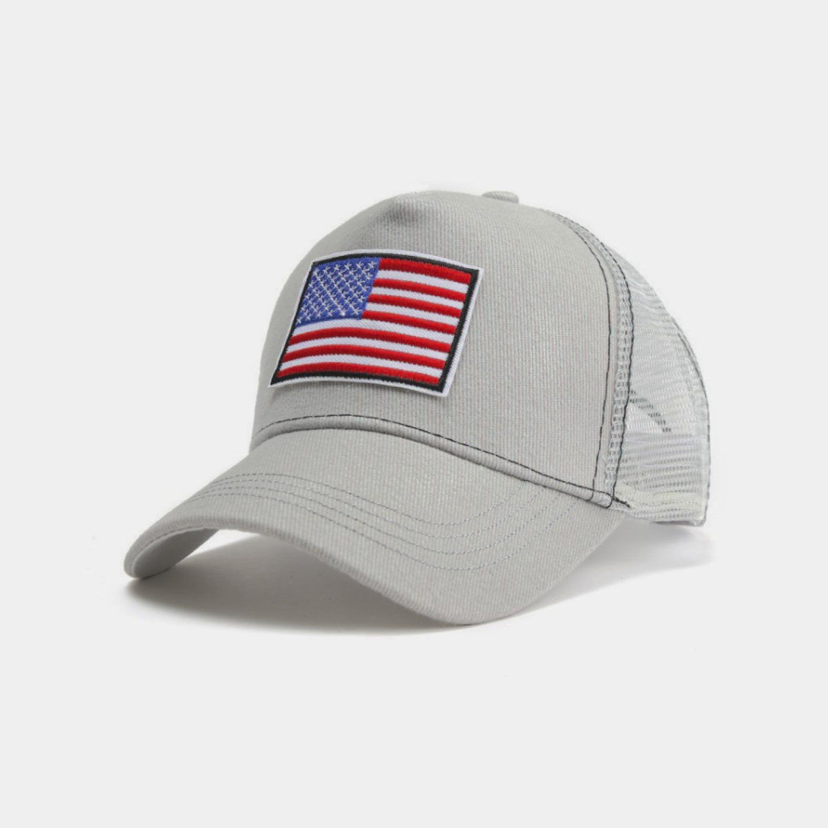 a grey hat with an american flag patch